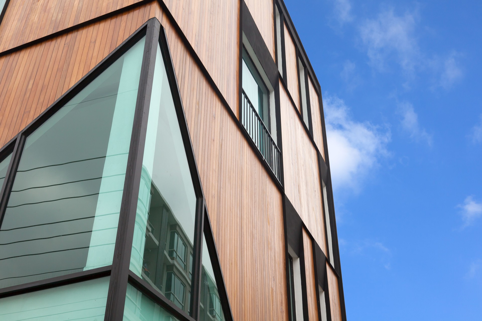 Wood facade on modern apartment house